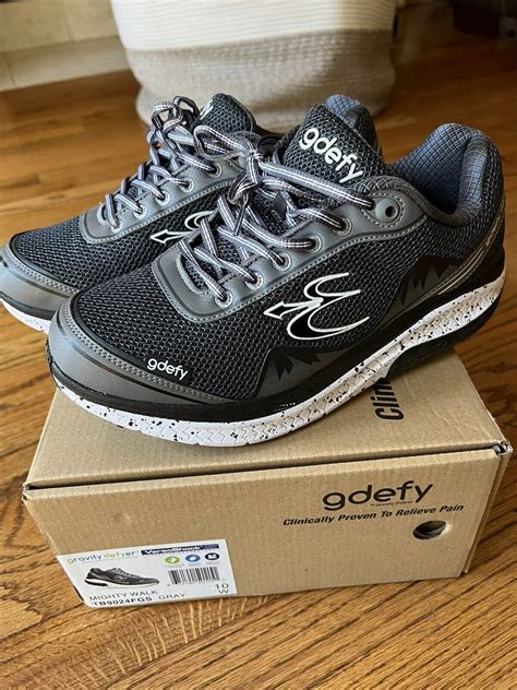 who makes gdefy shoes